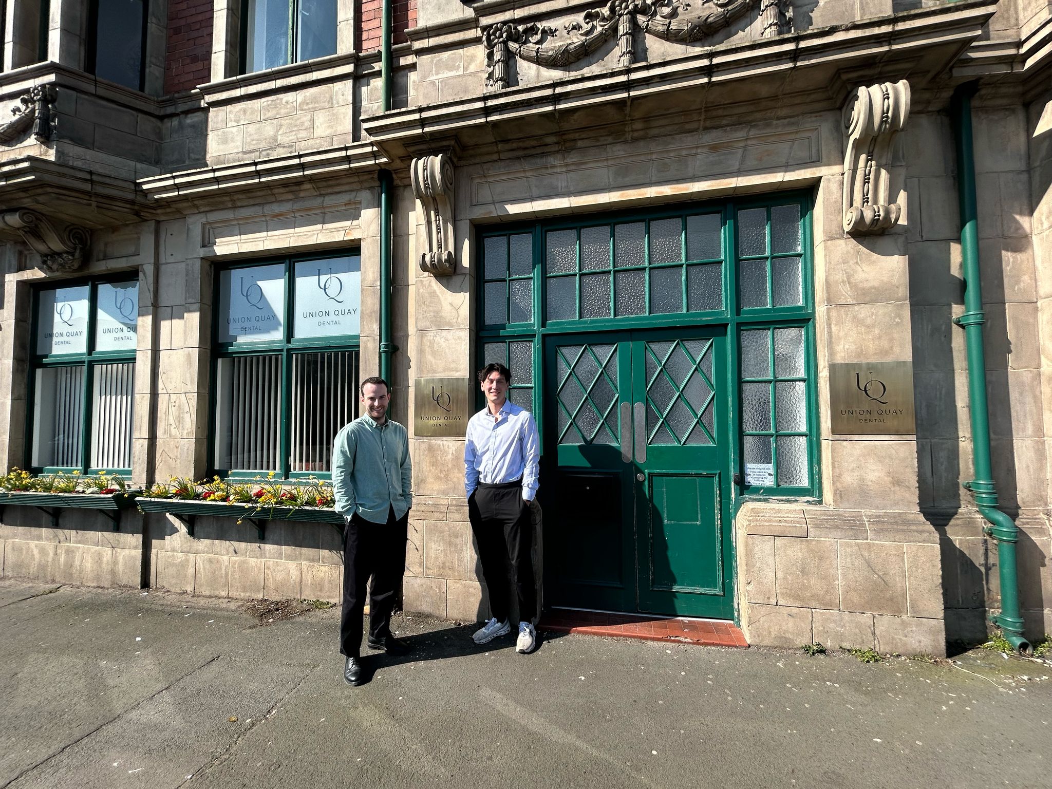 Dr Jarlath McAteer and Dr Jamie Dury in front of their new dental practice, Union Quay Dental