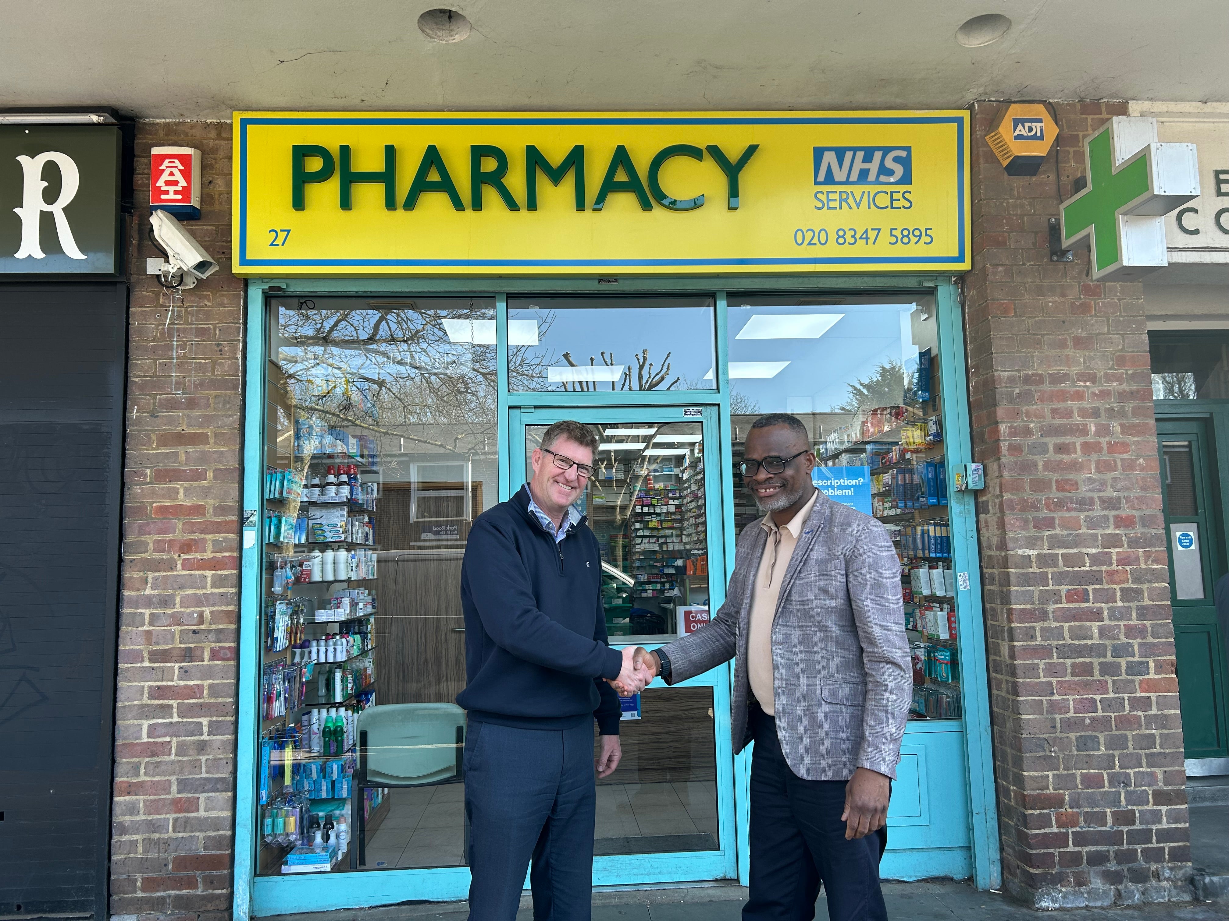 Mark Page from Christie & Co with the new owner of Pharmacia Naturale in North London, Igho Egorr