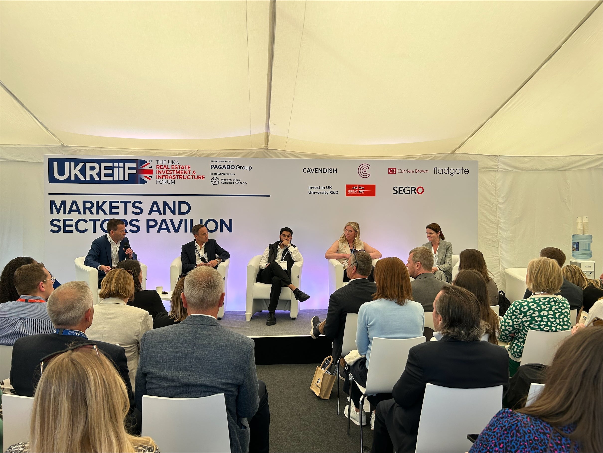 A panel discussion at UKREiiF 2025