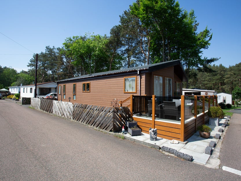 Close up shot of a modern holiday home with a balcony. 