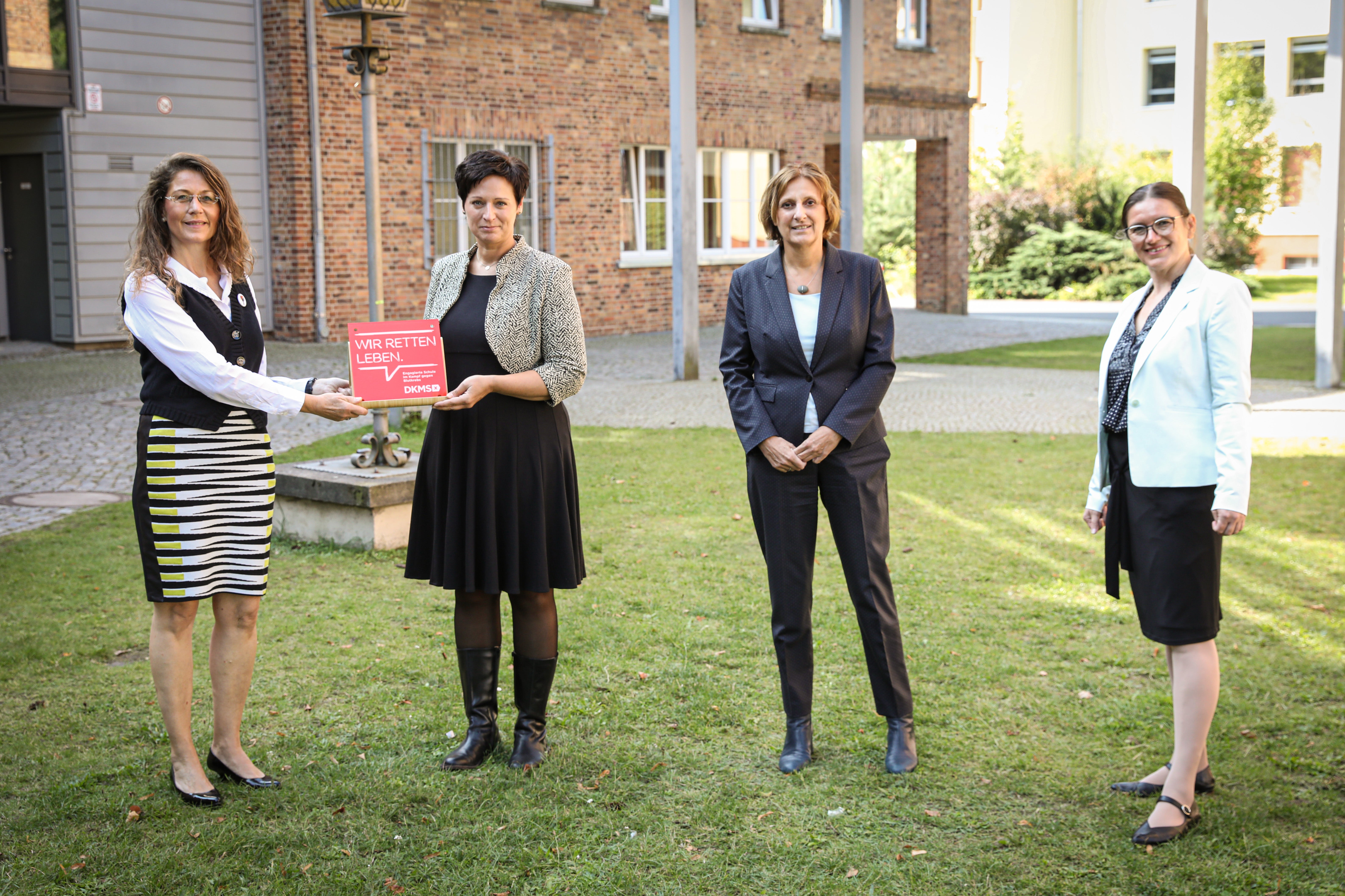 Simone Kopp (OSZ I Barnim), Bianca Düring, Britta Ernst, Konstanze Burkard posieren für ein Foto