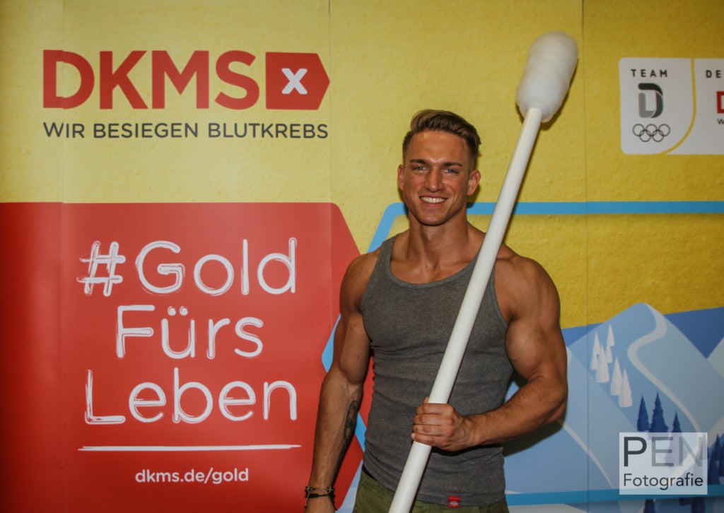 Der ehem. Mister Berlin und heutige Soap-Star Patrick Fabian zu Besuch beim DKMS-Stand auf der FIBO 2018; Foto: PEN Fotografie