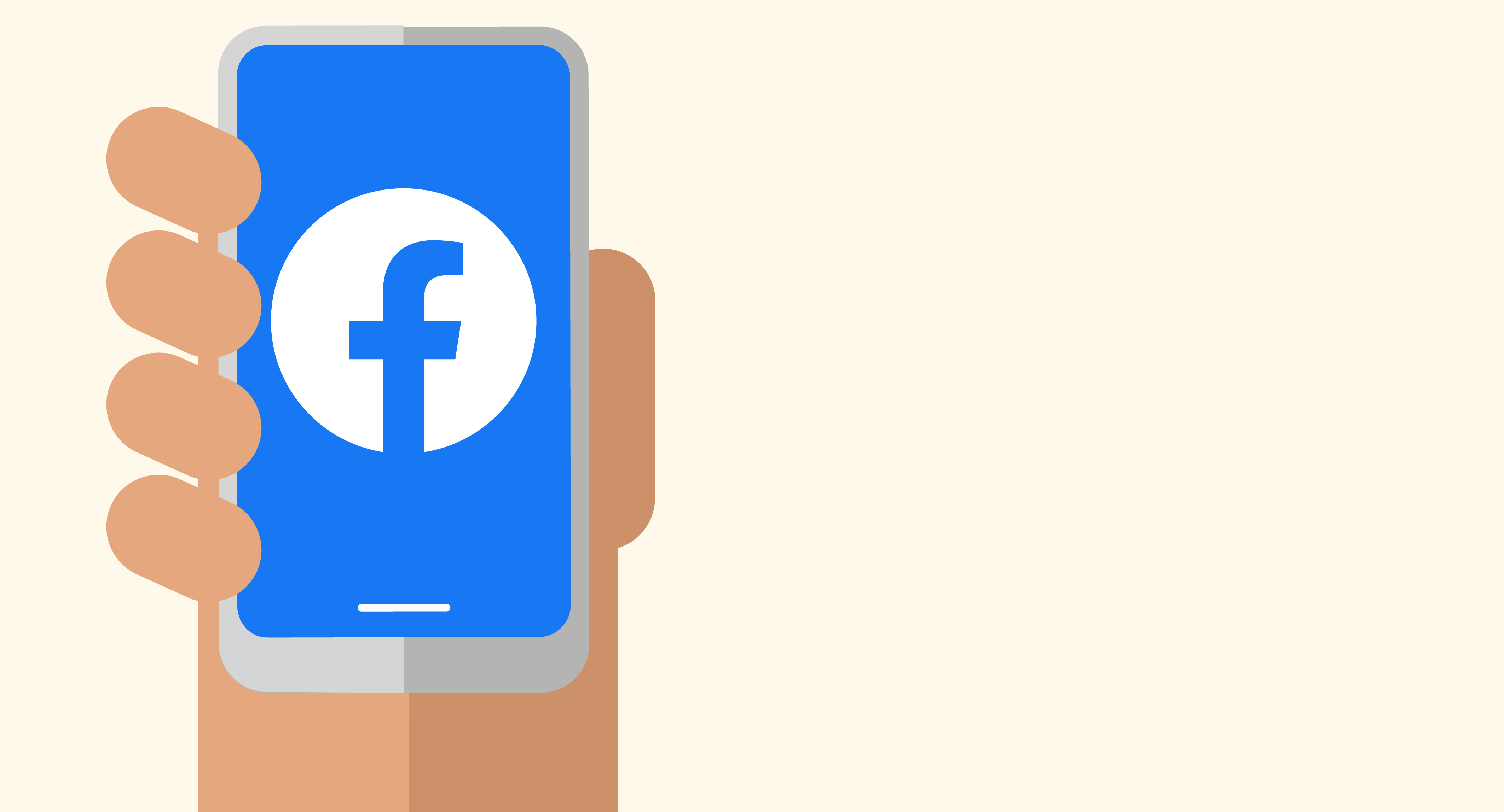 Eine Hand hält ein Handy mit Facebook Icon