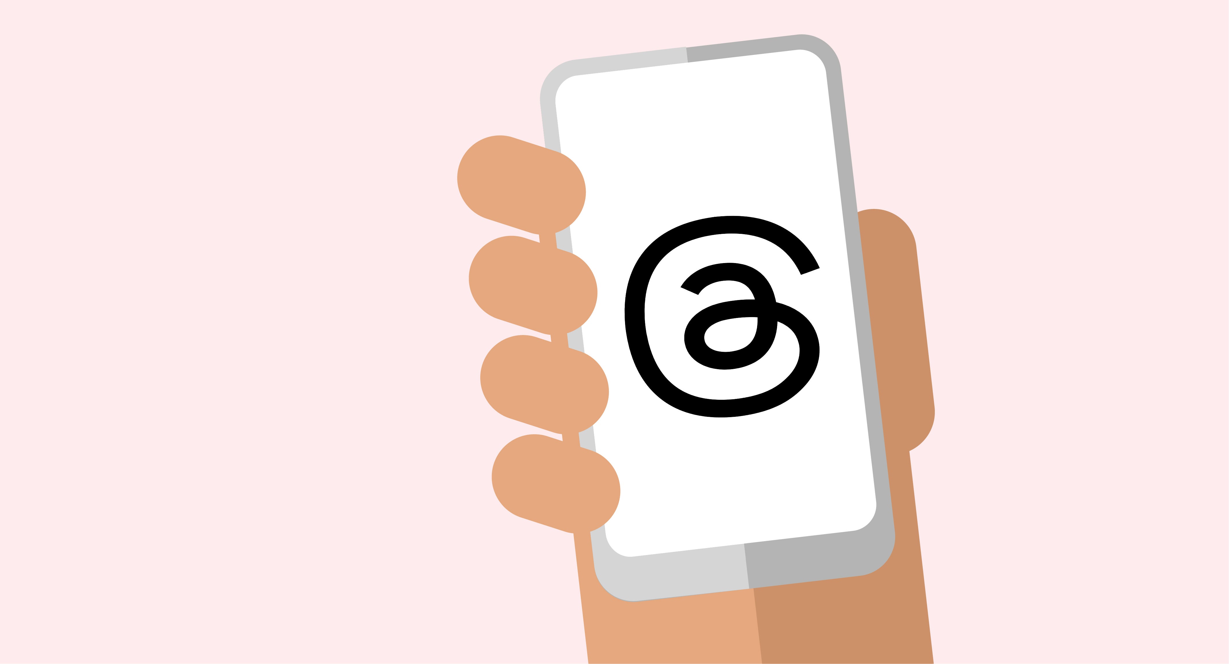 Eine Hand hält ein Handy mit Threads Icon 