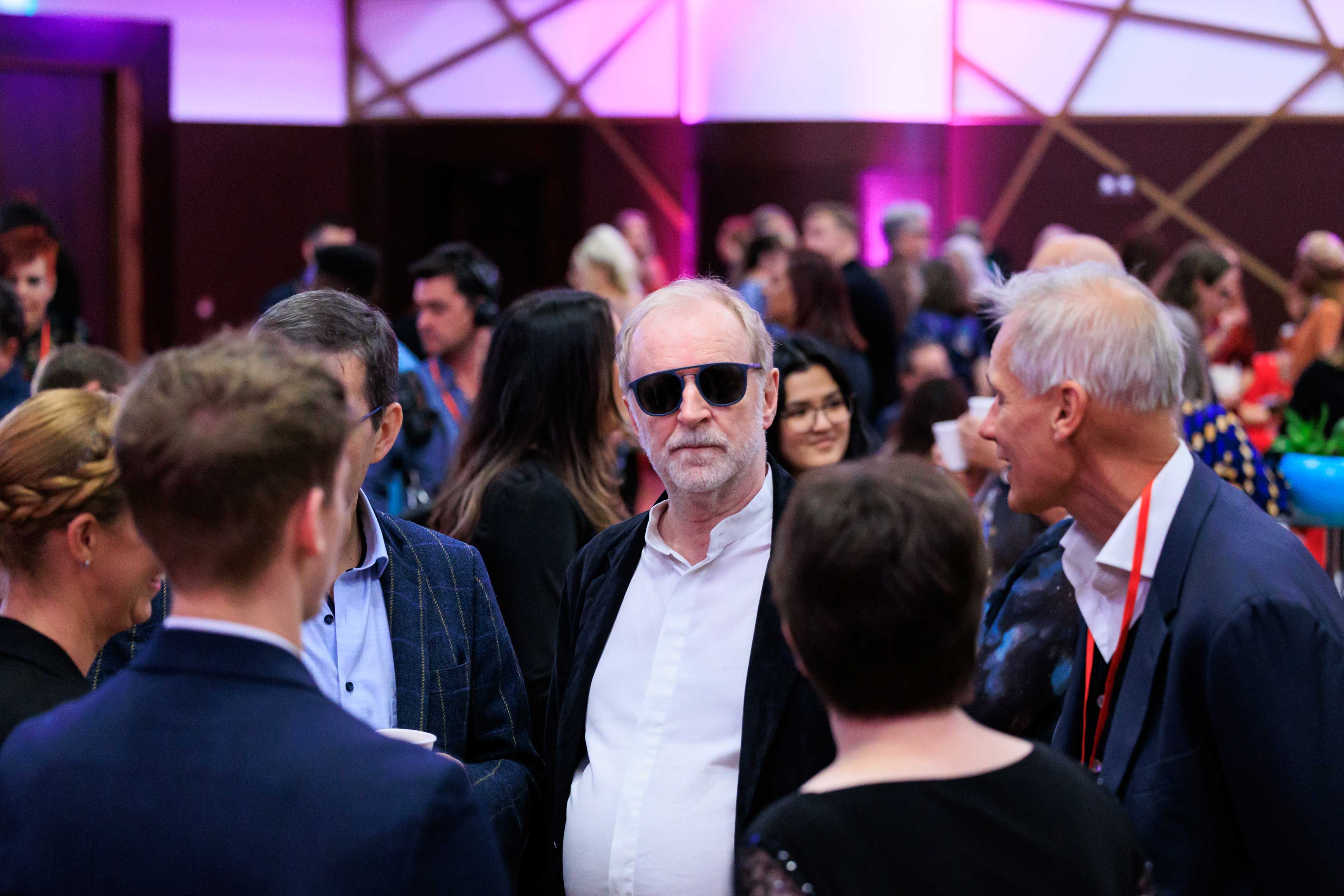 A group of people gathered at the awards ceremony