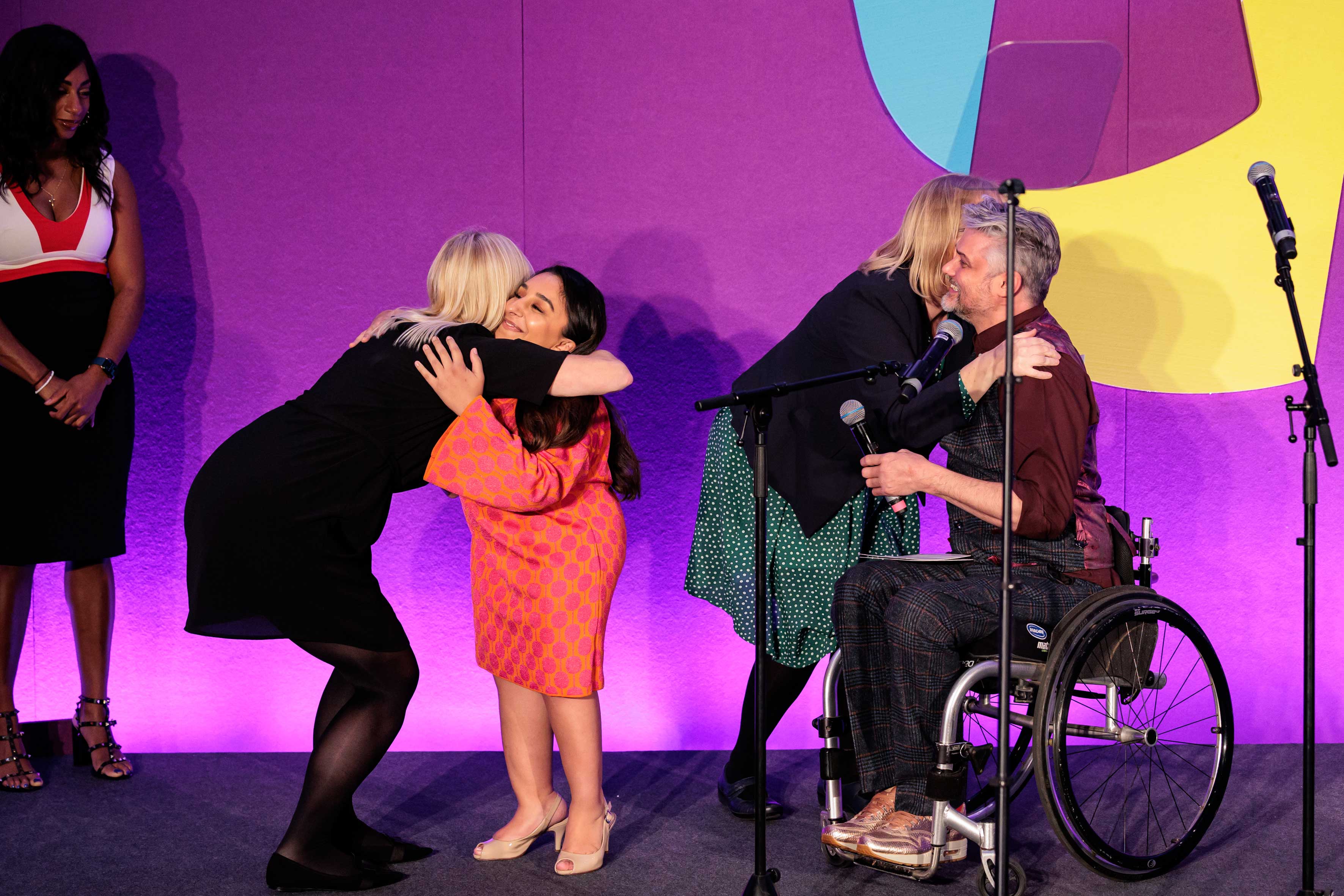 A group of people hugging