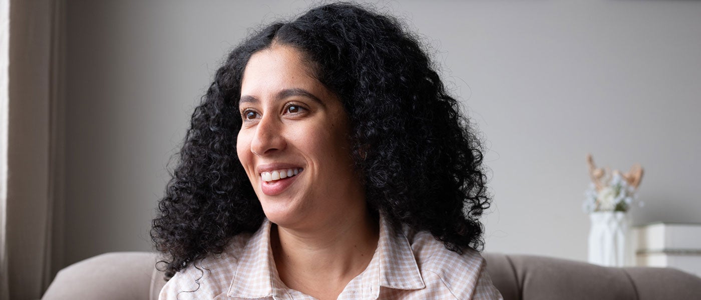 Woman talking on phone looking concerned