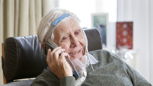 Older man on his mobile phone