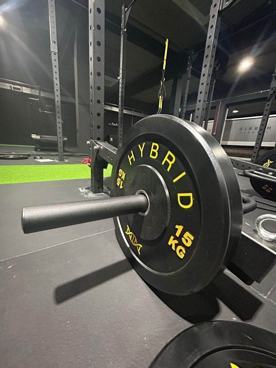 The Hybrid logo is printed in yellow on a weight