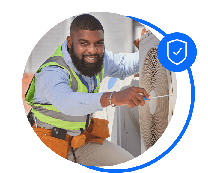 Handyman fixing a fan