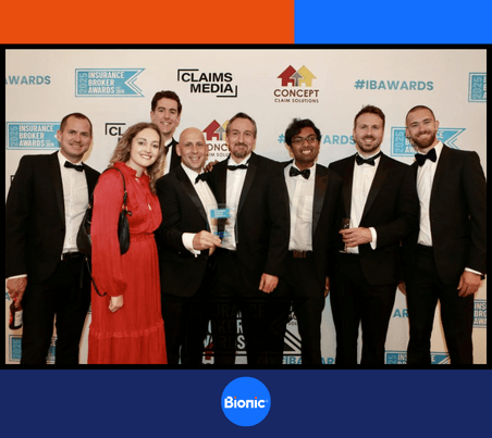 Insurance team photo holding 'Best Use Of Technology' Highly Commended Award