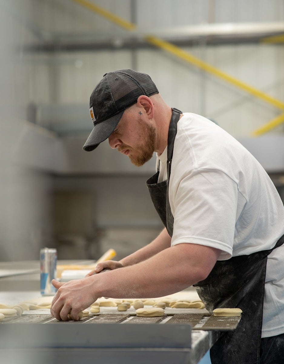 CEO Wade Smith making doughnuts 