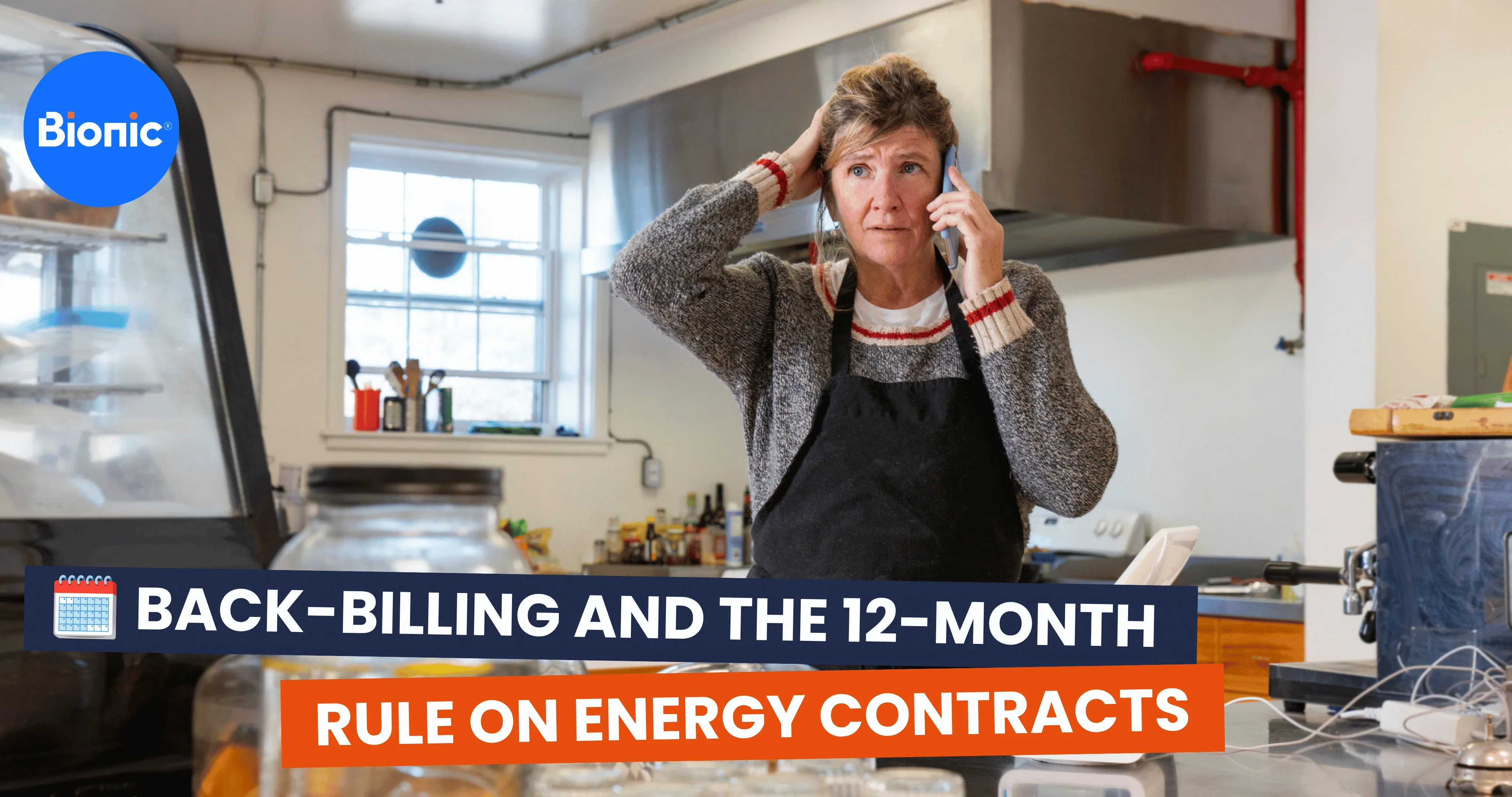 Person wearing an apron in a commercial kitchen speaking on a mobile phone beside food preparation equipment, with Bionic branding and the text: “Back-billing and the 12-month rule on energy contracts.”
