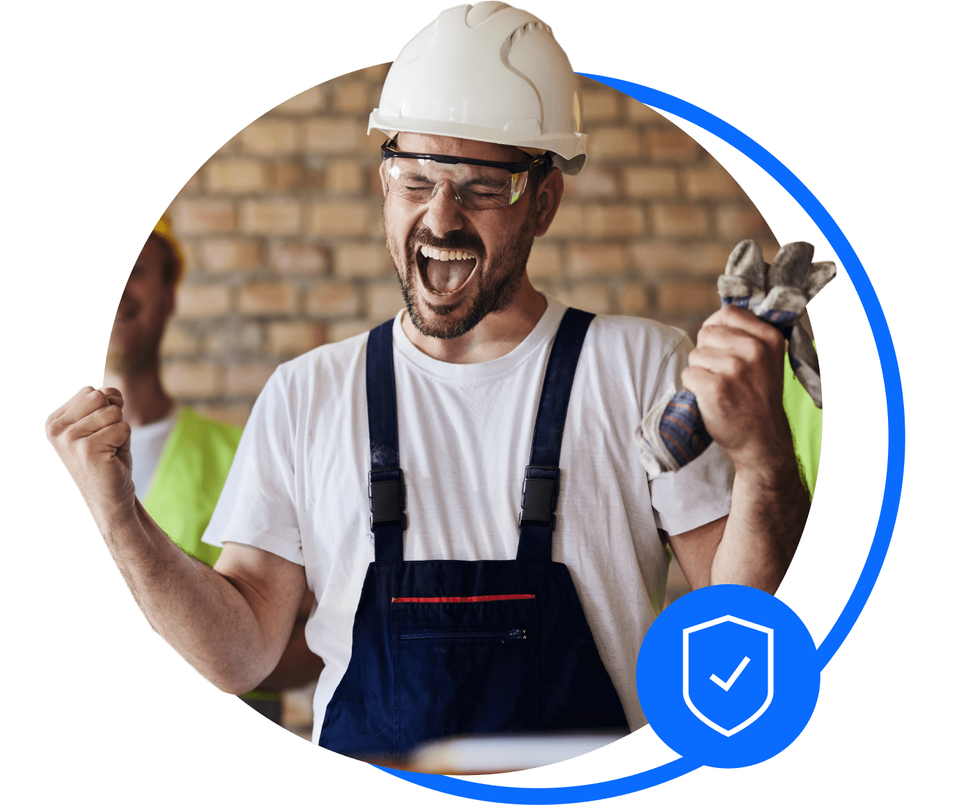 A builder in blue overalls punches theair and cheers after sorting his trades insurance.