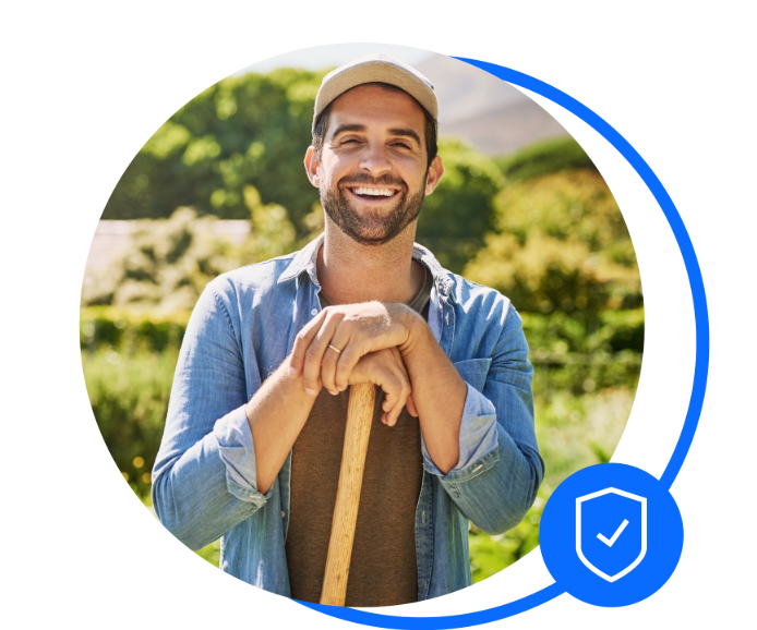 Male gardener holding a fork