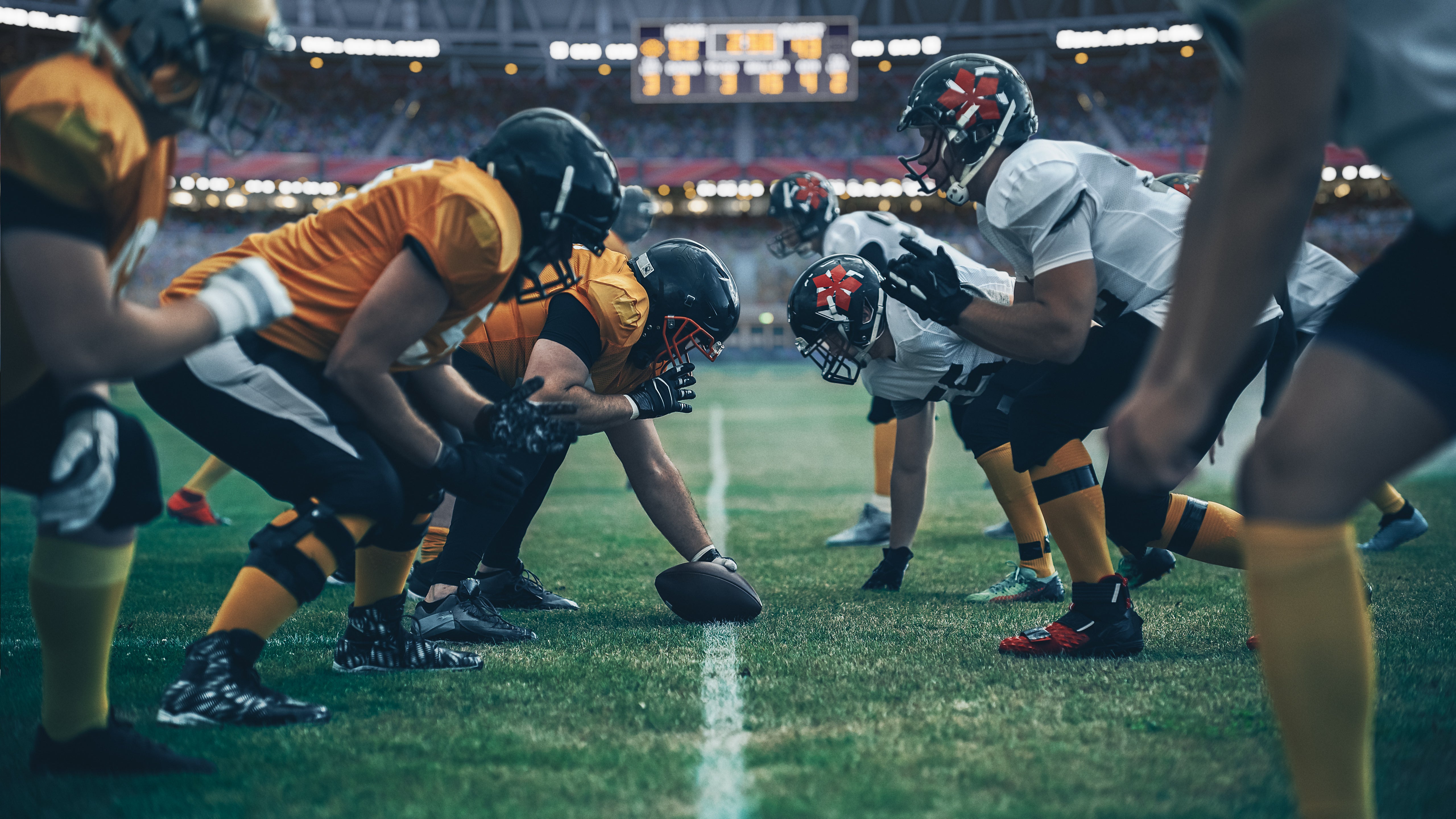 Two American Football teams facing off against each other