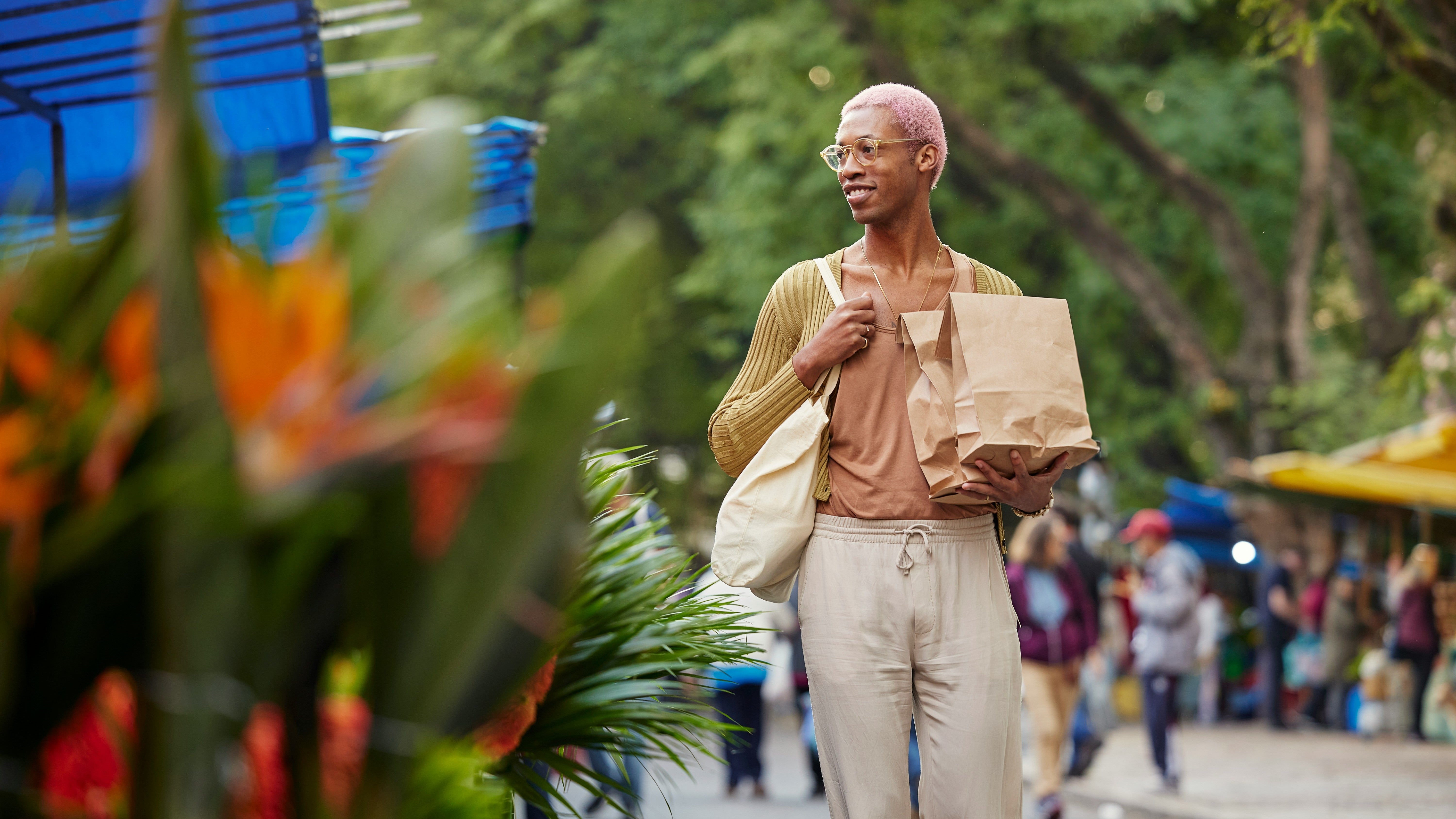 EMEA Mindset report front cover which shows a black man with pink hair looking to the right against a backdrop of trees