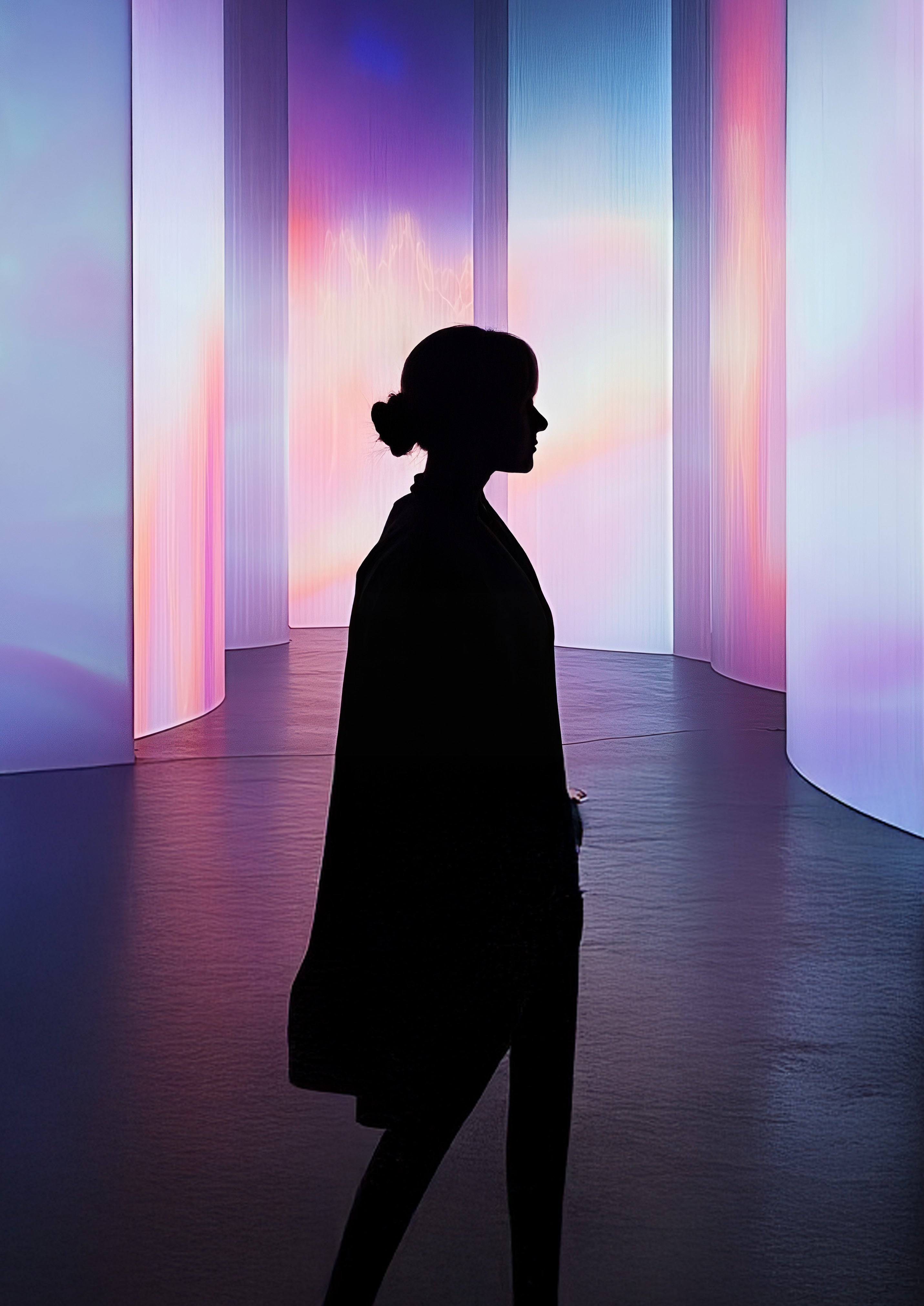 CES 2025 Rewind report front cover showing woman in silhouette in front of pink and blue screens