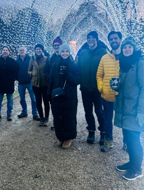 Ridgeway team outing to Blenheim Palace, holding hot drinks in the cold