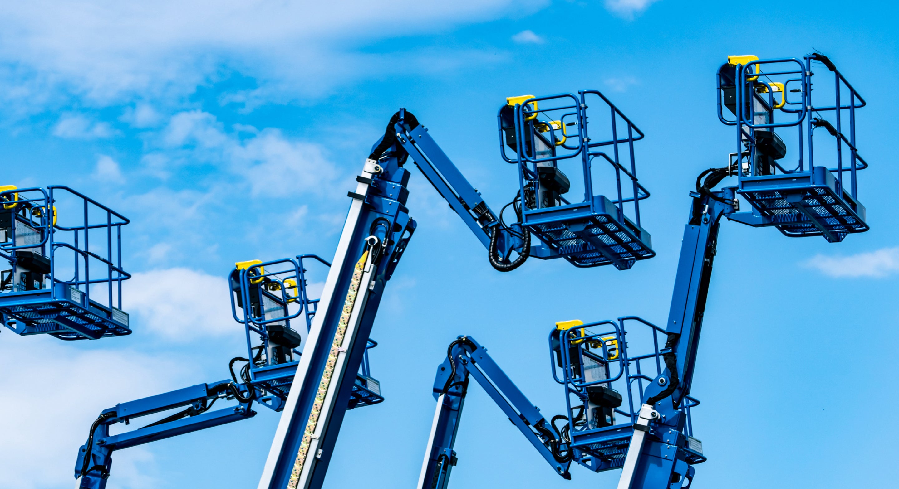 Group of powered platform lifts