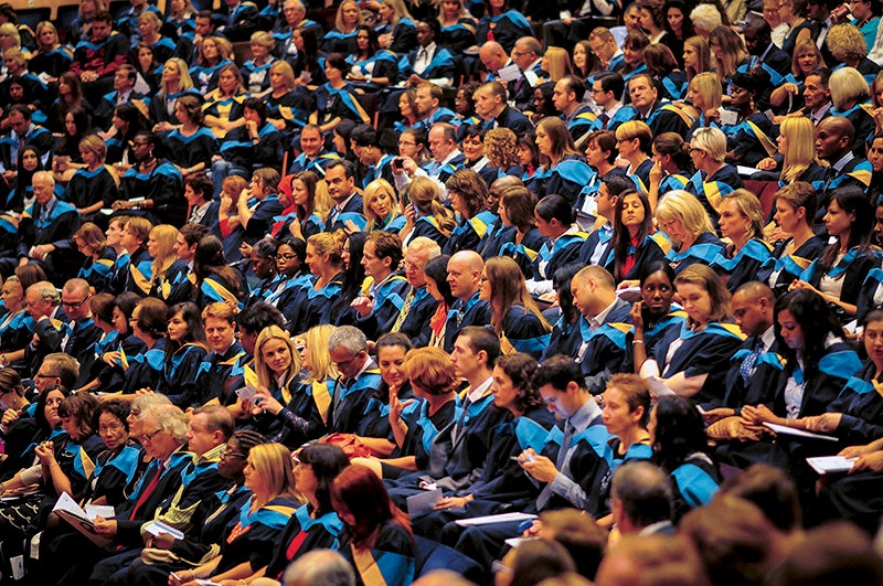 Students graduating from The Open University