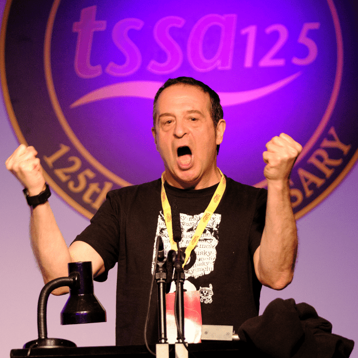 Mark Thomas performing at TSSA125 event