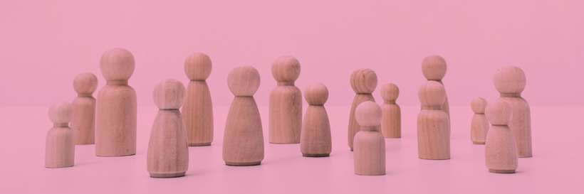 A collection of wooden figures representing people. 