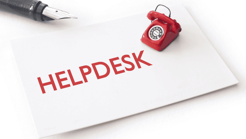 Card saying 'helpdesk' with red phone and pen