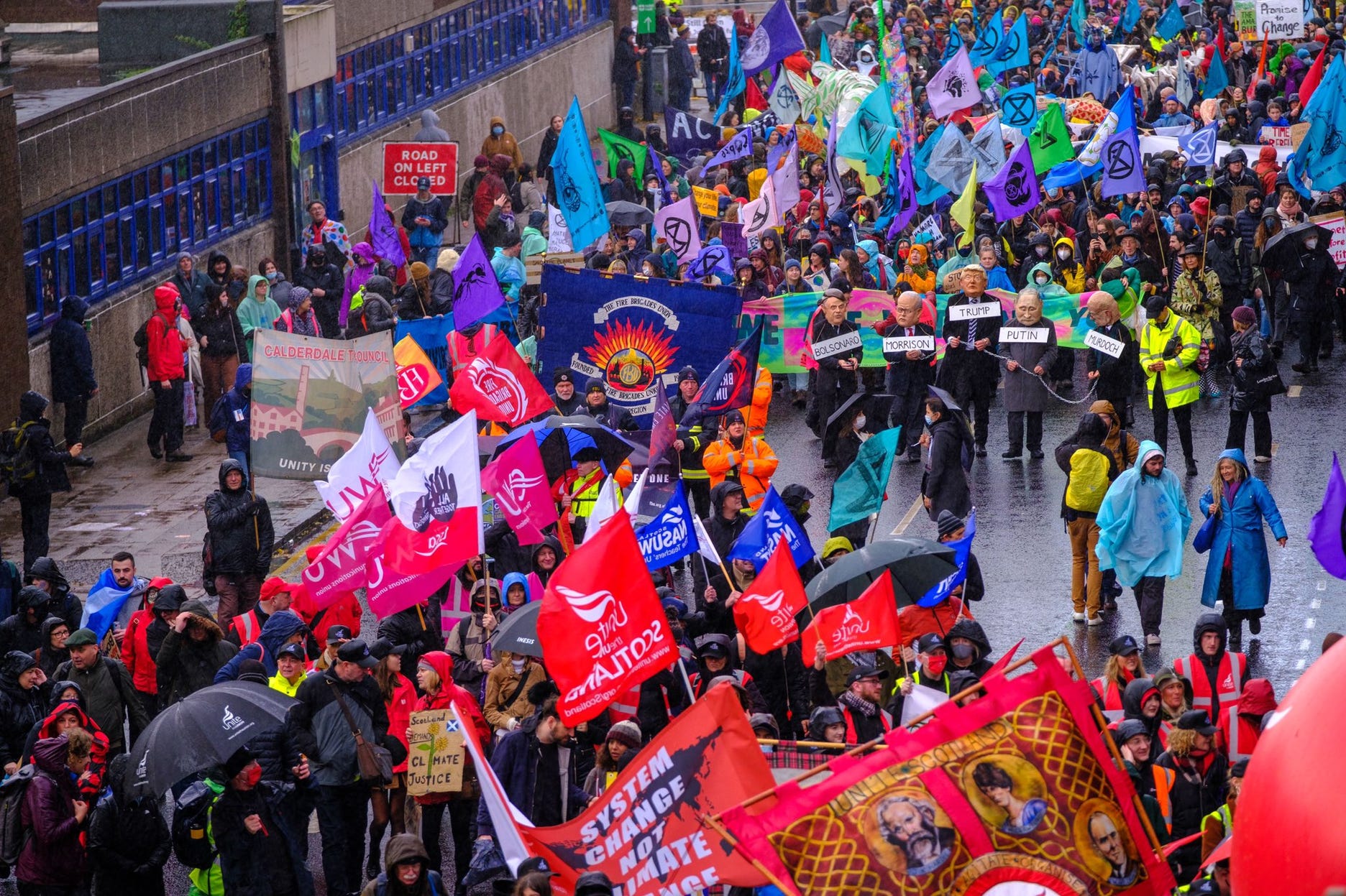 Trade union banners at COP26 climate march