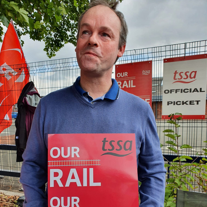 Danny Murphy on picket holding TSSA sign