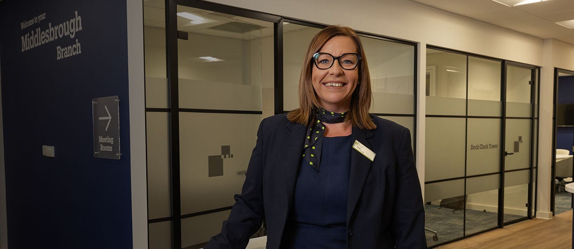 Kelly, Middlesbrough's branch manager smiling in the branch