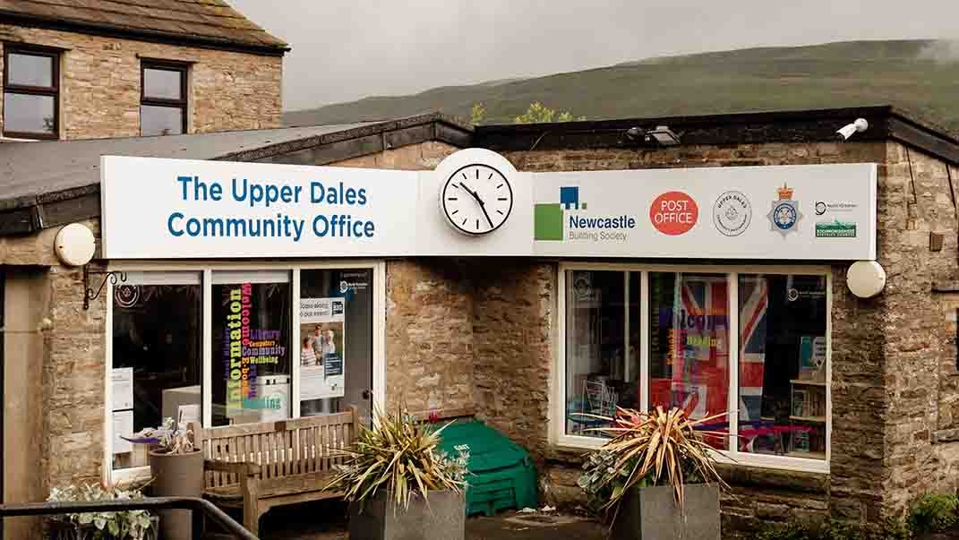 A building with a clock on the front