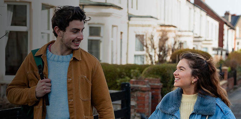 First time buyers walking down a street