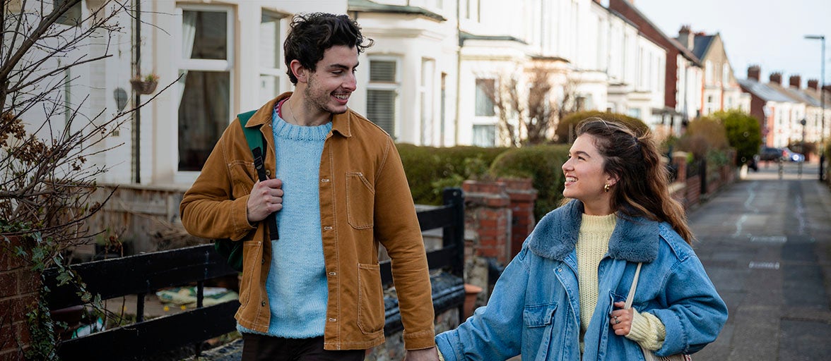 First time buyers walking down a street