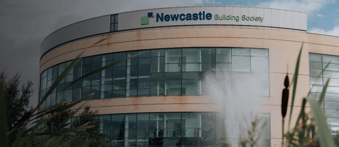 Cobalt Office building on a sunny day with a fountain in the foreground