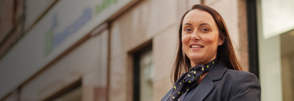 Sunderland's Branch Manager, Donna, stood in front of branch.