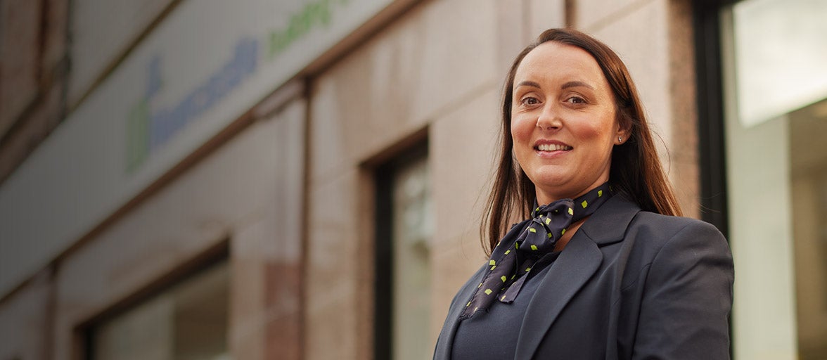 Sunderland's Branch Manager, Donna, stood in front of branchh, 