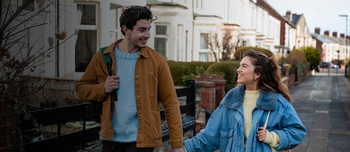 First time buyers walking down a street