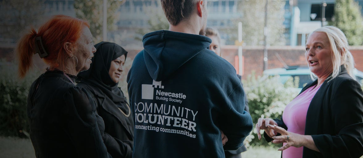 Colleagues talking to Parker Foundation