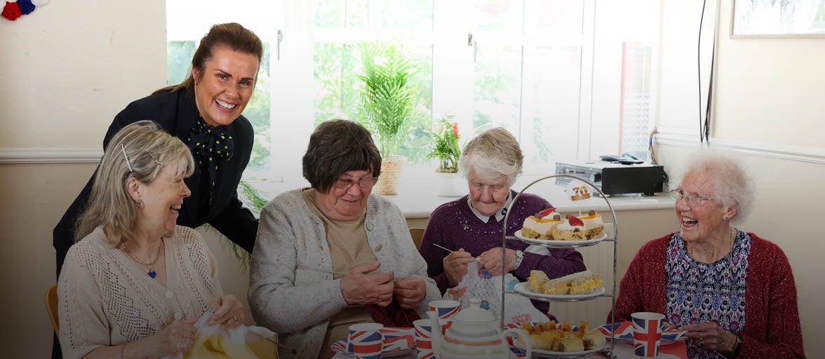 Ladies of the Age UK knitting club in Darlington with a colleague. 