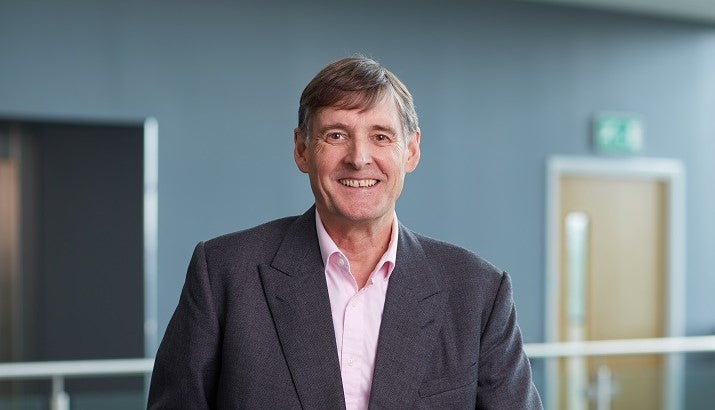 ames Ramsbitham smiling at camera in Cobalt office
