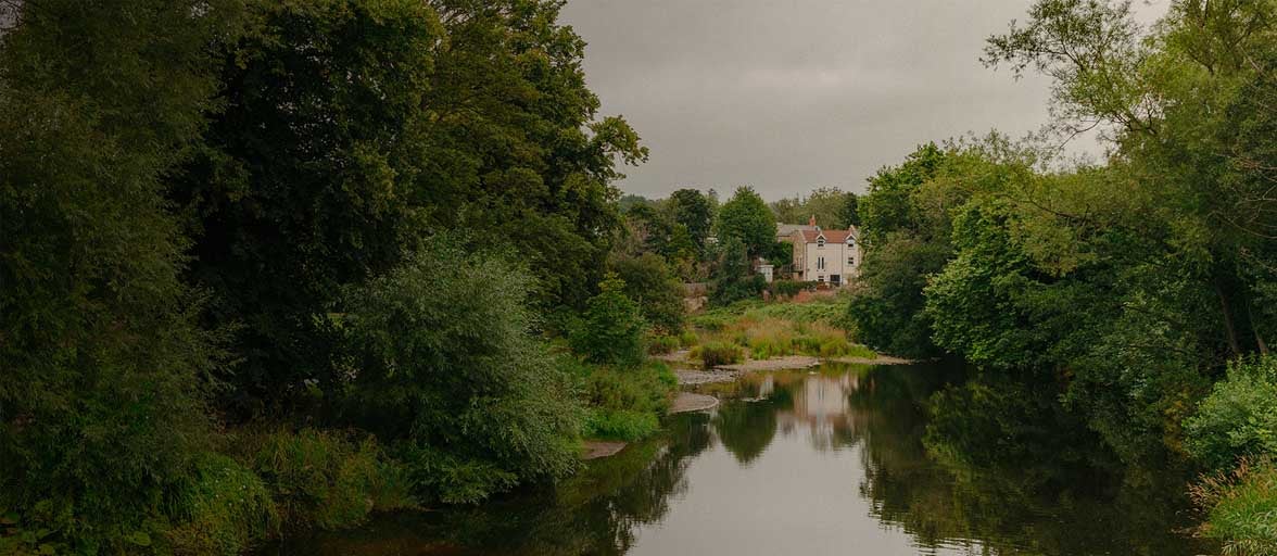 Scenic photo of a river in Morpeth.
