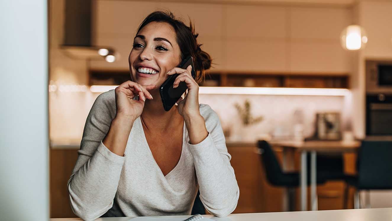 A woman talking on a mobile phone. 