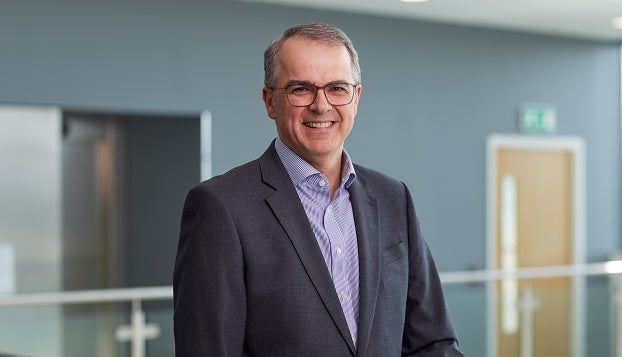 Andrew Haigh smiling in Cobalt office.