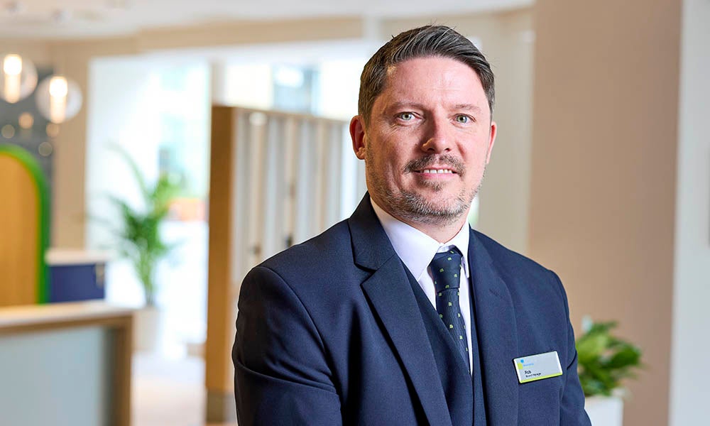 Monument Branch Manager, Rob, stood inside the branch. 