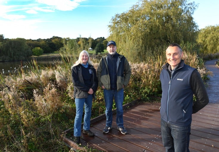 Mandy Bell and John Cokill of Durham Wildlife Trust stood with Paul Edwards, Head of Enterprise Risk at Newcastle Building Society, near Shibdon Pond