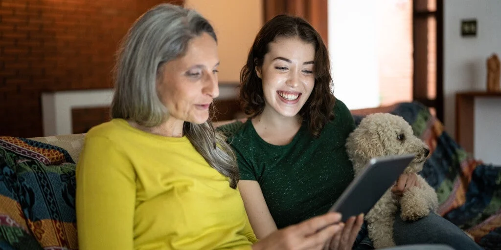 Older woman looking at tablet