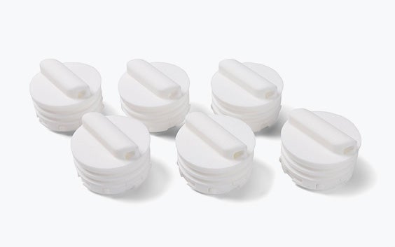 Six round 3D-printed parts for Sartorius' spectroport, made in PA 12 using SLS.