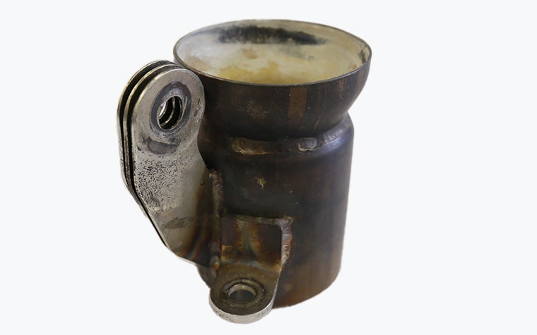 The original muffler coupler for powered gliders, made in steel with traditional manufacturing methods.