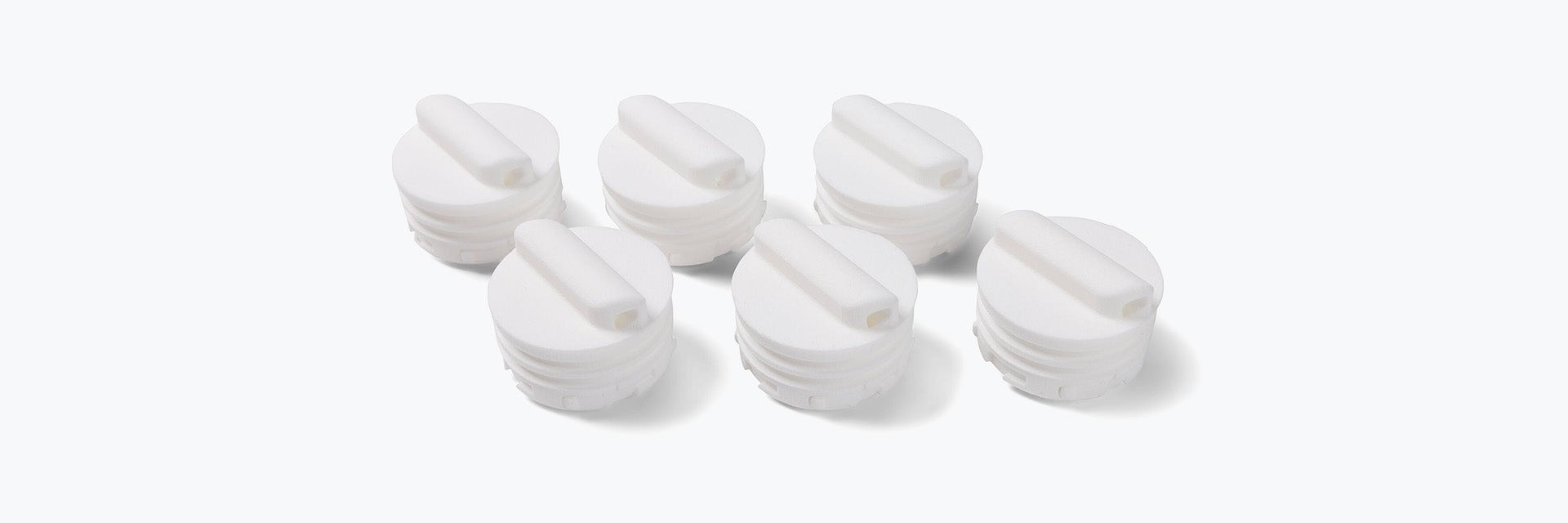 Six round 3D-printed parts for Sartorius' spectroport, made in PA 12 using SLS.